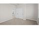 Neutral bedroom with closet and light gray carpet at 21044 E 63Rd Dr, Aurora, CO 80019