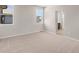 Cozy bedroom featuring neutral carpet and windows providing lots of natural light at 21044 E 63Rd Dr, Aurora, CO 80019