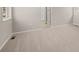 Spacious bedroom features neutral carpet and ample natural light at 21044 E 63Rd Dr, Aurora, CO 80019