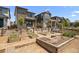 Community garden features wooden planting beds and shared gardening area at 21044 E 63Rd Dr, Aurora, CO 80019