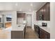 Modern kitchen featuring stainless steel appliances, ample counter space, and lots of light at 21044 E 63Rd Dr, Aurora, CO 80019