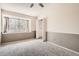 Cozy bedroom with neutral gray carpet, natural light, and closet at 7373 E Iowa Ave # 1112, Denver, CO 80231