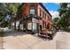 Charming brick building with a wine bar on the corner of the street at 1640 N Downing St # 103, Denver, CO 80218