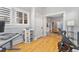 Comfortable office with natural light, practical desk, and adjacent doorway to the living area at 1640 N Downing St # 103, Denver, CO 80218
