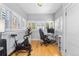 Bright home office featuring multiple windows with views and a well lit workspace at 1640 N Downing St # 103, Denver, CO 80218
