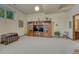 Finished basement offers cozy carpeting, entertainment center, and comfortable living space at 30 Eagle Dr, Littleton, CO 80123