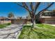 Charming single Gathering home with a two car garage and a lush green lawn in a mature neighborhood at 30 Eagle Dr, Littleton, CO 80123