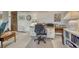 Functional home office with desk, storage, and ample lighting for productivity at 30 Eagle Dr, Littleton, CO 80123