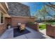 Cozy outdoor patio with table and chairs, perfect for relaxing or entertaining guests at 30 Eagle Dr, Littleton, CO 80123