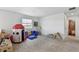 Spacious bonus room with natural light, neutral carpet, and fun decor perfect for  at 3699 Makley Cir, Castle Rock, CO 80104