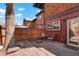Enclosed patio space with outdoor furniture and secure fencing at 1279 S Sable Blvd, Aurora, CO 80012