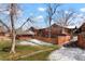 Exterior shot of the property showcasing the backyard and surrounding landscape at 1279 S Sable Blvd, Aurora, CO 80012
