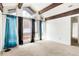 Spacious bedroom with vaulted ceilings, large windows and curtains at 1279 S Sable Blvd, Aurora, CO 80012
