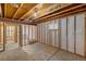 Partially framed basement ready for customization with laundry hookups and ample space at 4393 E Andover Ave, Castle Rock, CO 80104