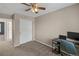 Comfortable bedroom featuring a closet, desk, and versatile design at 4393 E Andover Ave, Castle Rock, CO 80104