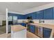 Spacious kitchen featuring stainless steel appliances, ample counter space, and modern finishes at 4393 E Andover Ave, Castle Rock, CO 80104