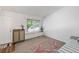 Bright and open living room with natural light streaming through a large window at 4393 E Andover Ave, Castle Rock, CO 80104