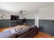 Inviting living room featuring modern decor, hardwood floors, and open layout at 4393 E Andover Ave, Castle Rock, CO 80104
