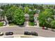 Aerial shot captures a charming neighborhood street lined with mature trees and well-kept homes at 4393 E Andover Ave, Castle Rock, CO 80104