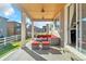Covered patio with outdoor seating perfect for relaxing and enjoying the views at 2594 Scoter Ln, Castle Rock, CO 80104