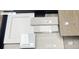 Selection of interior finishes featuring flooring, cabinetry, backsplash, countertops, and tile at 30 Waterford St, Erie, CO 80516