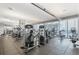 Spacious gym featuring state-of-the-art equipment and large windows offering natural light at 891 14Th St # 1408, Denver, CO 80202