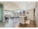 Open-concept kitchen with stainless steel appliances, white countertops, and city views at 891 14Th St # 1408, Denver, CO 80202