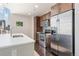 Well-equipped kitchen boasting stainless steel appliances and sleek finishes for modern living at 891 14Th St # 1408, Denver, CO 80202