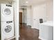 Convenient laundry area with stacked washer and dryer units at 891 14Th St # 1408, Denver, CO 80202