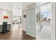 Open-concept living space with a combined living and work area, and large windows with city views at 891 14Th St # 1408, Denver, CO 80202