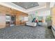 Lounge area with stylish seating, library, staircase, and modern design at 891 14Th St # 1408, Denver, CO 80202