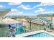 Rooftop pool offers stunning city views with an Xfinity advertisement in the foreground at 891 14Th St # 1408, Denver, CO 80202