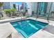 Rooftop hot tub with blue-tile trim, steel handrails, and city views at 891 14Th St # 1408, Denver, CO 80202
