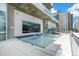 Rooftop hot tub surrounded by serene blue tile with in-water loungers and city views at 891 14Th St # 1408, Denver, CO 80202