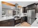 Contemporary kitchen with updated appliances, stylish cabinets, and a functional layout at 3210 Magnolia St, Denver, CO 80207