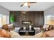 Stylish living room featuring a sleek fireplace, statement decor, and comfortable seating at 3210 Magnolia St, Denver, CO 80207