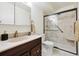 Modern bathroom with a tiled shower and marble accents at 660 S Alton Way # 3B, Denver, CO 80247