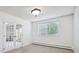 Cozy bedroom featuring carpet and french doors leading to a balcony at 660 S Alton Way # 3B, Denver, CO 80247