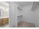 This walk-in closet is located off of the bathroom and features built-in shelving at 5276 S Danube St, Centennial, CO 80015