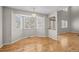 A kitchen-adjacent breakfast nook with a view of a bay window for lots of natural light and outdoor views at 5276 S Danube St, Centennial, CO 80015