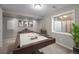 Finished basement transformed into a game room with a pool table, seating, and stylish decor at 5276 S Danube St, Centennial, CO 80015