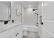Modern bathroom with sleek fixtures, tiled walls, and a combination shower and tub at 8530 W 52Nd Ave # A1, Arvada, CO 80002