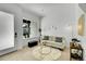 Inviting living room featuring natural light, a cozy sofa, and minimalist decor for a modern aesthetic at 8530 W 52Nd Ave # A1, Arvada, CO 80002