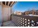Outdoor balcony area with wooden deck and railing offering community views and fresh air at 12360 W Nevada Pl # 206, Lakewood, CO 80228