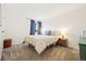 Cozy bedroom with a plush carpet and a sunny window view, creating a serene retreat at 12360 W Nevada Pl # 206, Lakewood, CO 80228