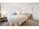Inviting bedroom boasts cozy carpeting and a charming dresser, providing a comfortable space at 12360 W Nevada Pl # 206, Lakewood, CO 80228