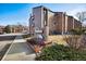 Shadow Hills condo community offers brick accents and manicured landscaping, with clear community signage at 12360 W Nevada Pl # 206, Lakewood, CO 80228