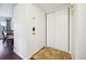 The entryway features a secure smart lock and a convenient sliding door closet for storage at 12360 W Nevada Pl # 206, Lakewood, CO 80228