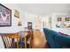Inviting living room and dining area featuring hardwood floors and an open floor plan at 12360 W Nevada Pl # 206, Lakewood, CO 80228
