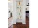 Charming architectural display shelves between kitchen and living room at 12360 W Nevada Pl # 206, Lakewood, CO 80228